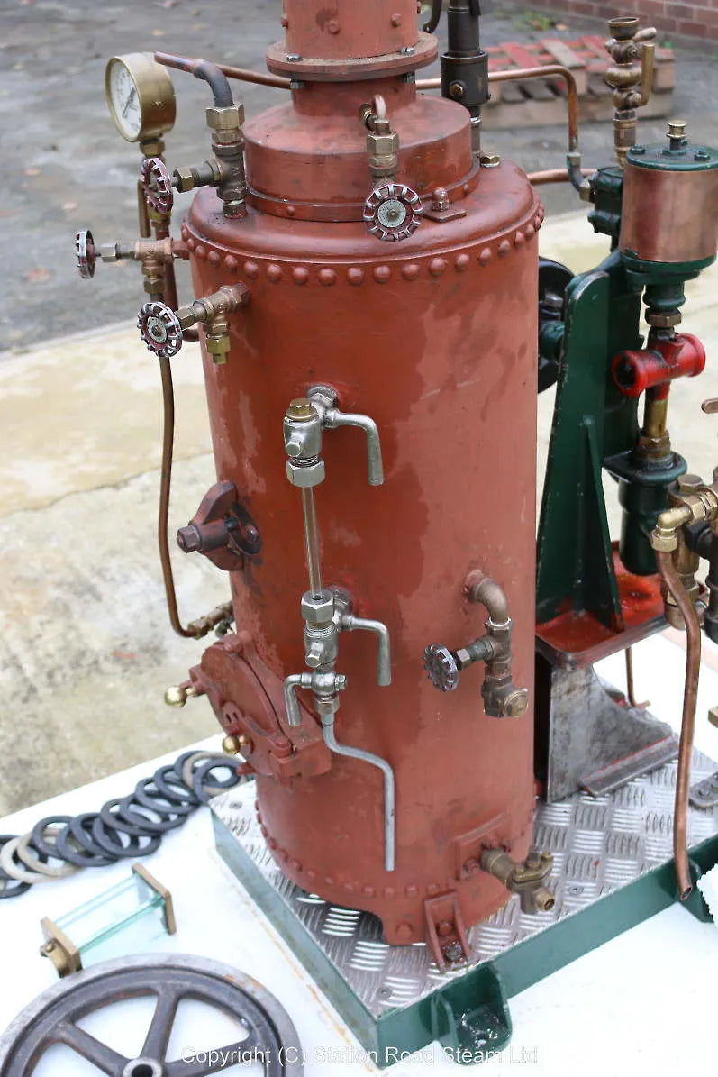 Vertical boiler with steam pump