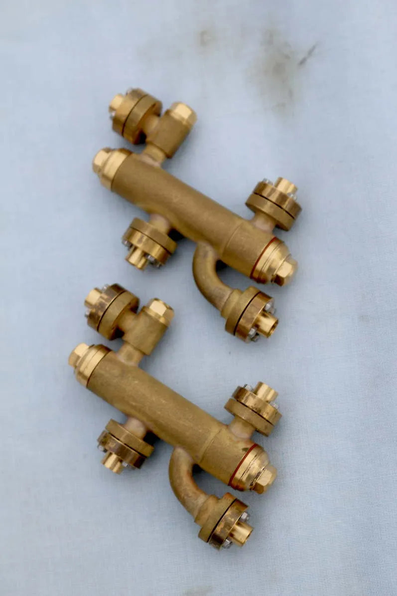 Pair Jubilee scale injectors