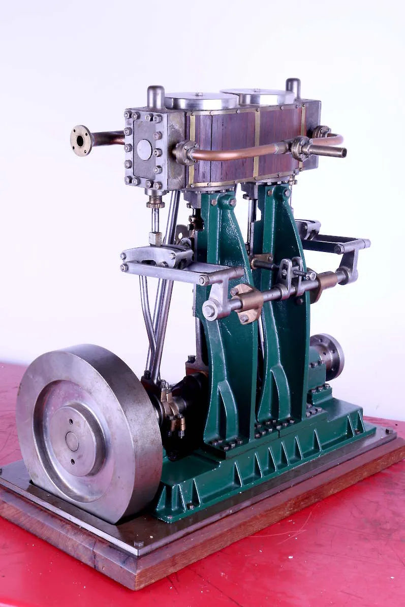 Vertical twin engine with reversing gear