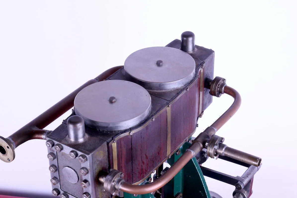 Vertical twin engine with reversing gear