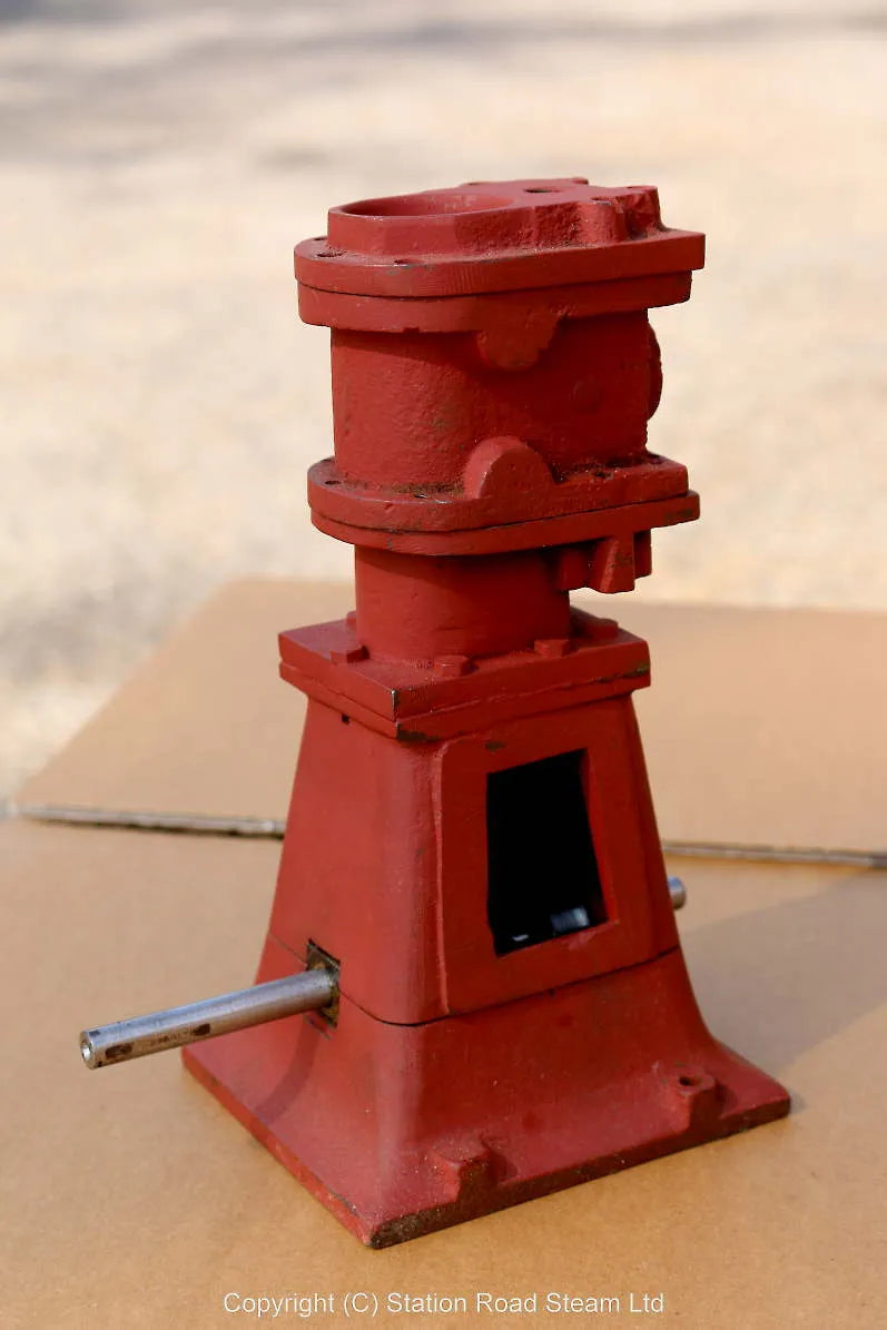 Part-built piston valve vertical engine