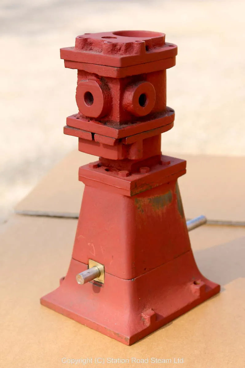 Part-built piston valve vertical engine
