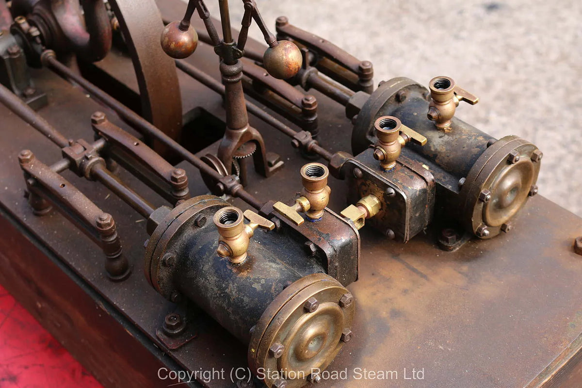 Antique twin cylinder horizontal engine