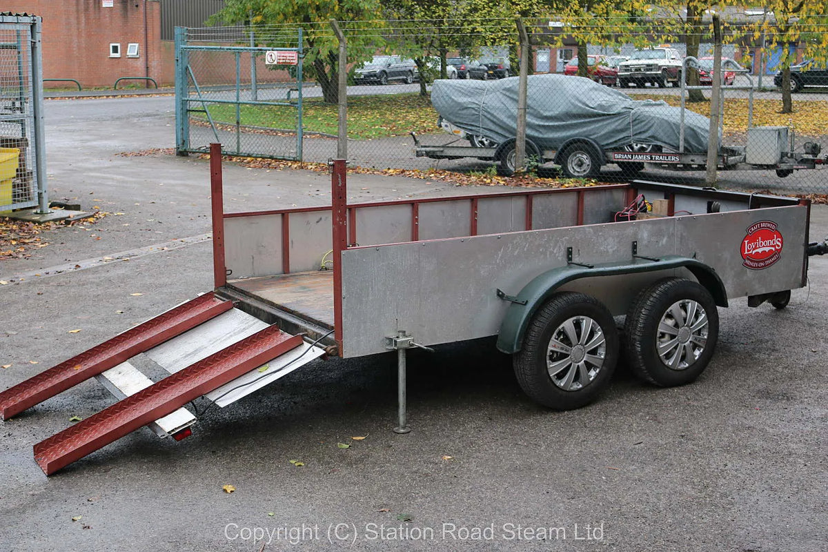 Four wheel road trailer with winch