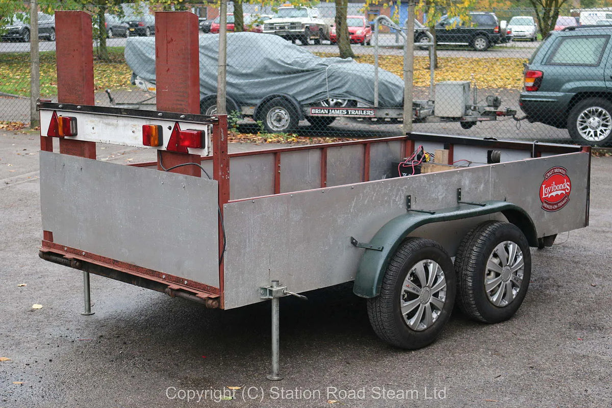 Four wheel road trailer with winch