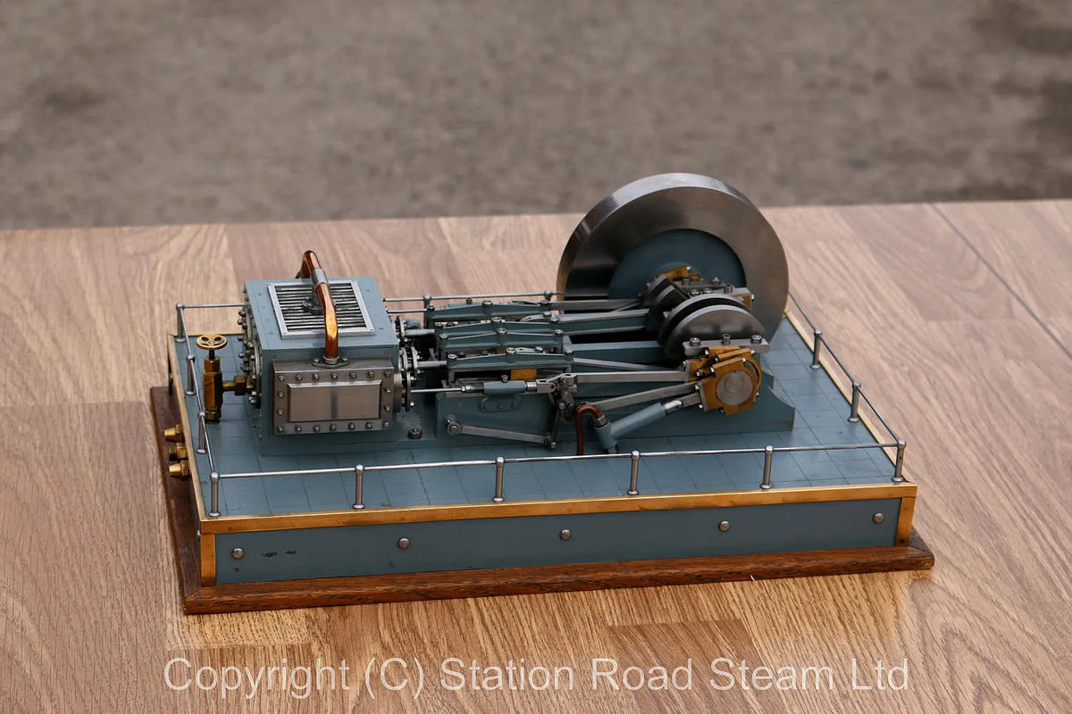 Horizontal twin mill engine with reversing gear