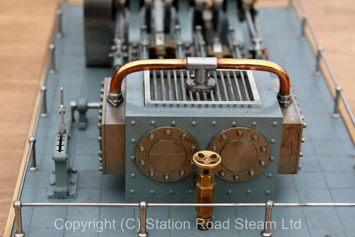 Horizontal twin mill engine with reversing gear