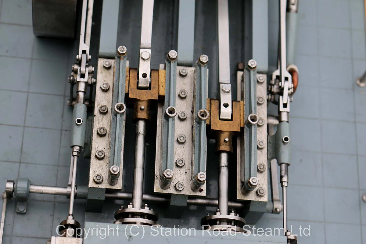 Horizontal twin mill engine with reversing gear