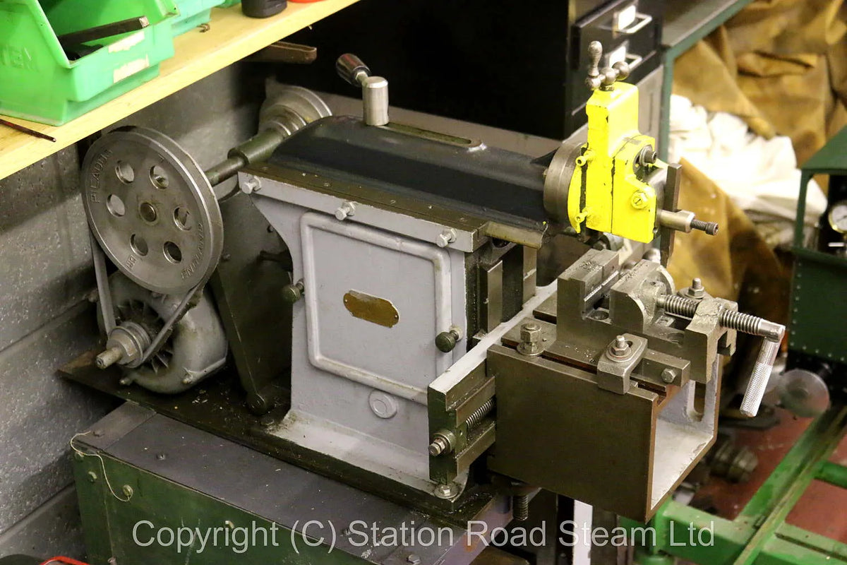 Small bench-mounted shaper