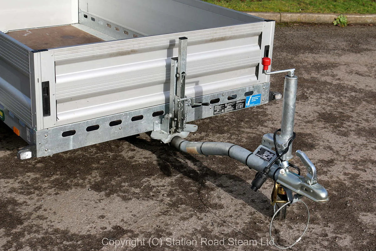 Two wheel tilt bed trailer