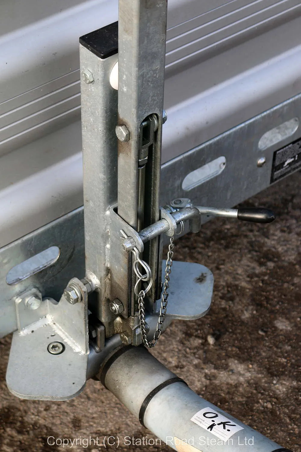 Two wheel tilt bed trailer