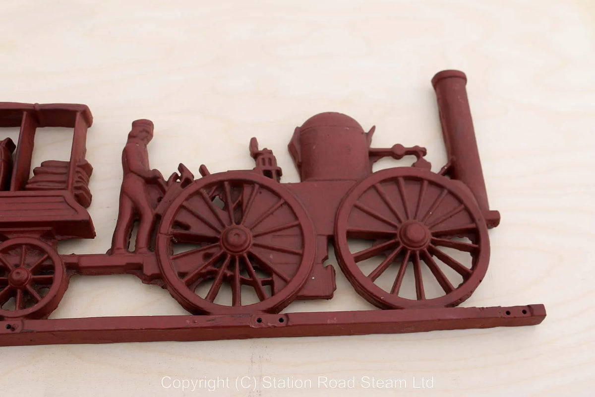 Cast iron wall plaque of early train