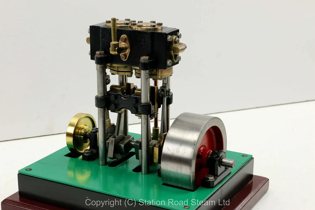 Vertical twin engine with marine flywheel