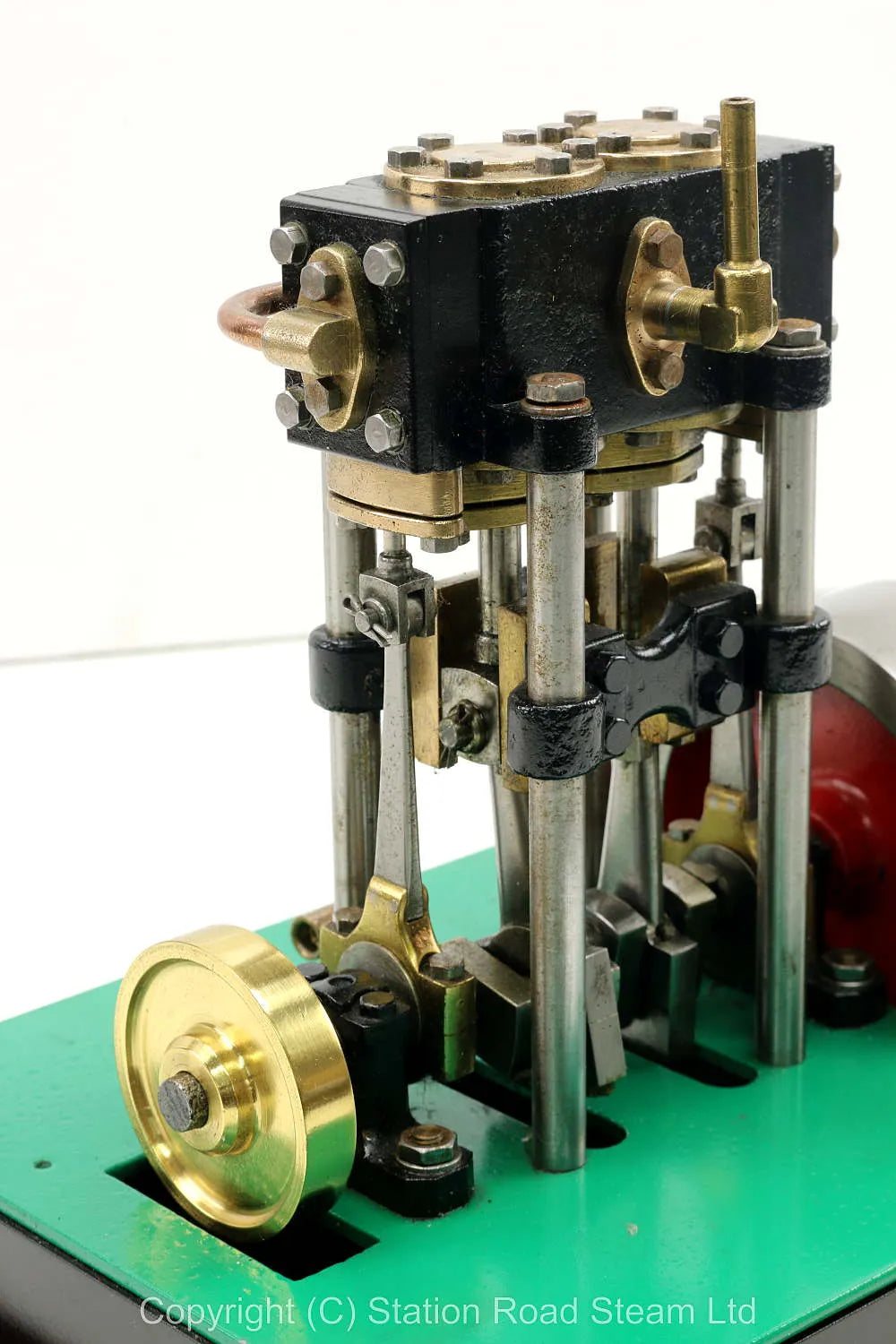 Vertical twin engine with marine flywheel