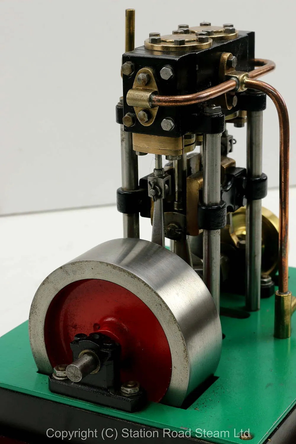 Vertical twin engine with marine flywheel
