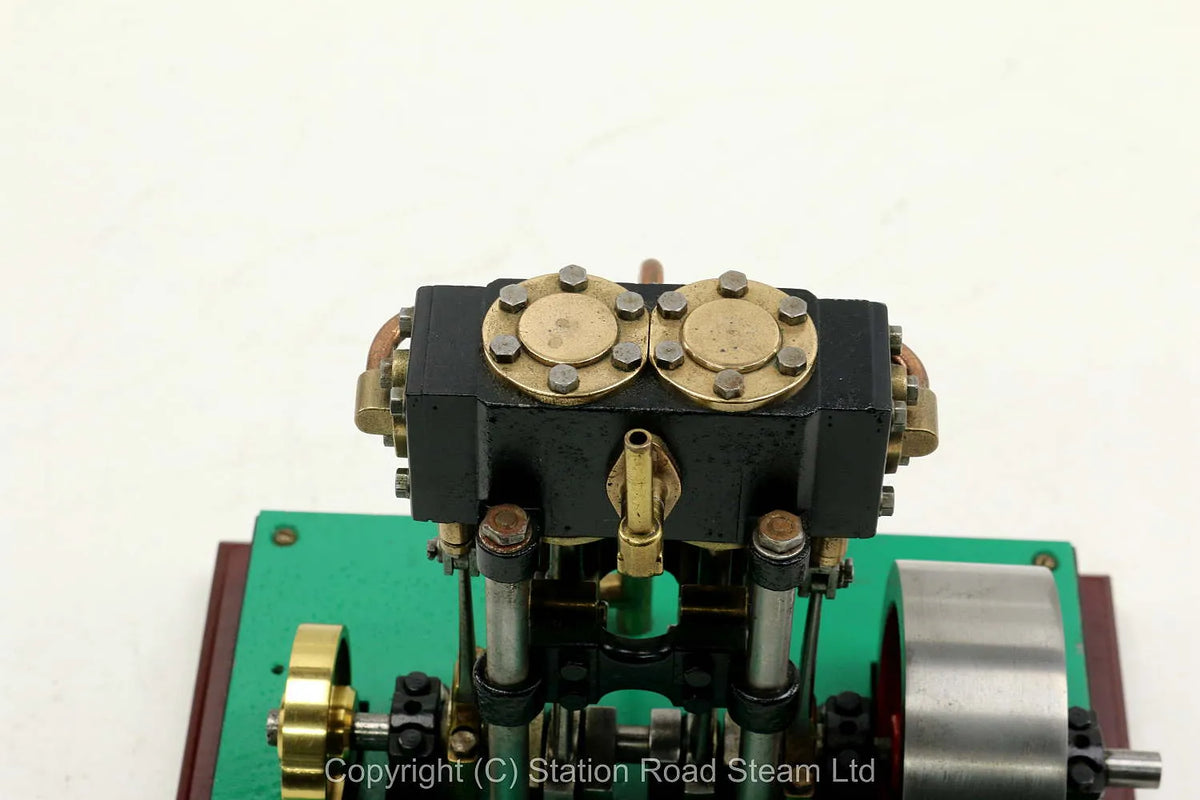 Vertical twin engine with marine flywheel