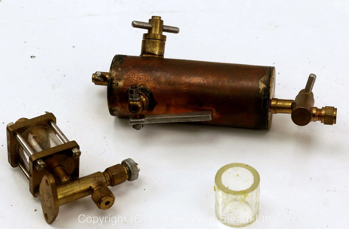 Displacement lubricator with sight feeder