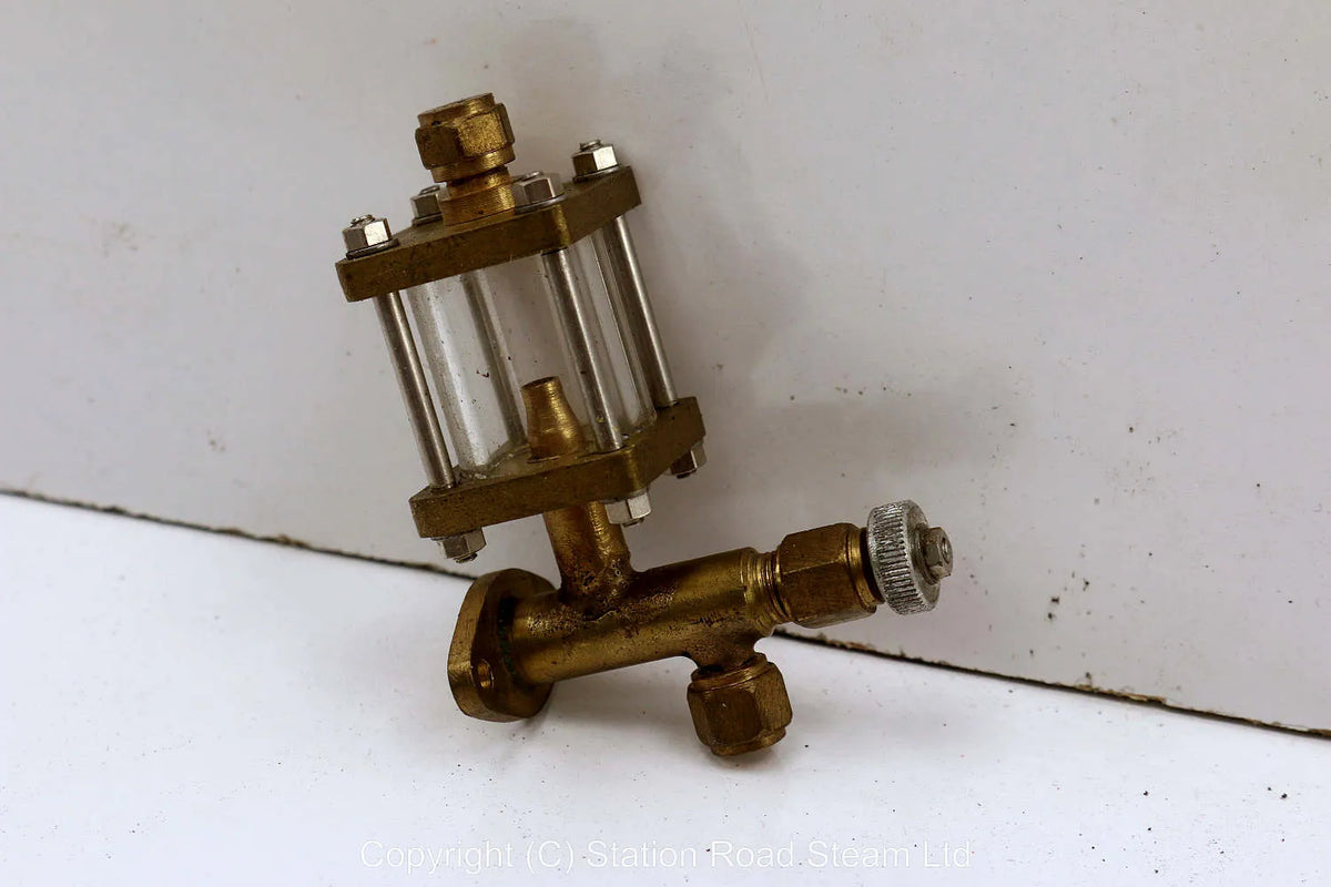 Displacement lubricator with sight feeder