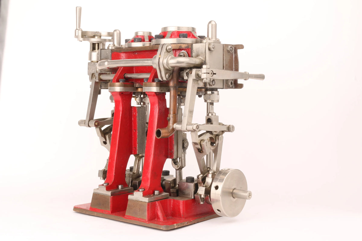 Compound twin with reversing gear