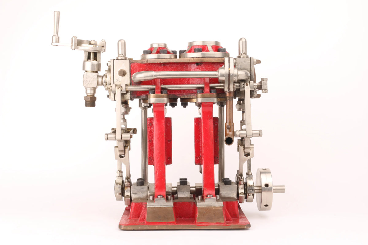 Compound twin with reversing gear