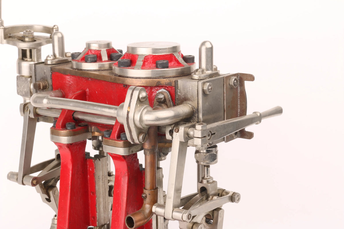 Compound twin with reversing gear