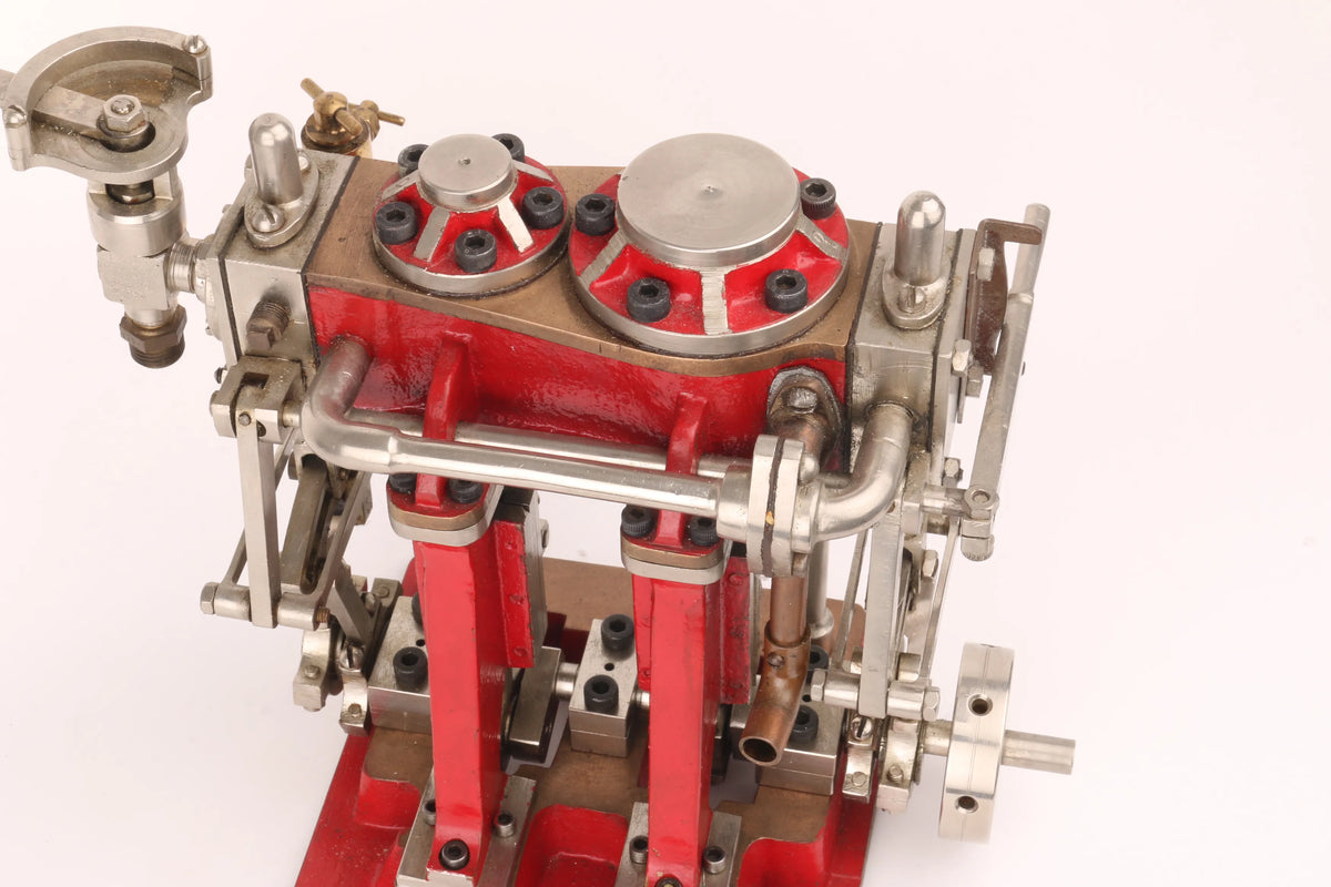 Compound twin with reversing gear
