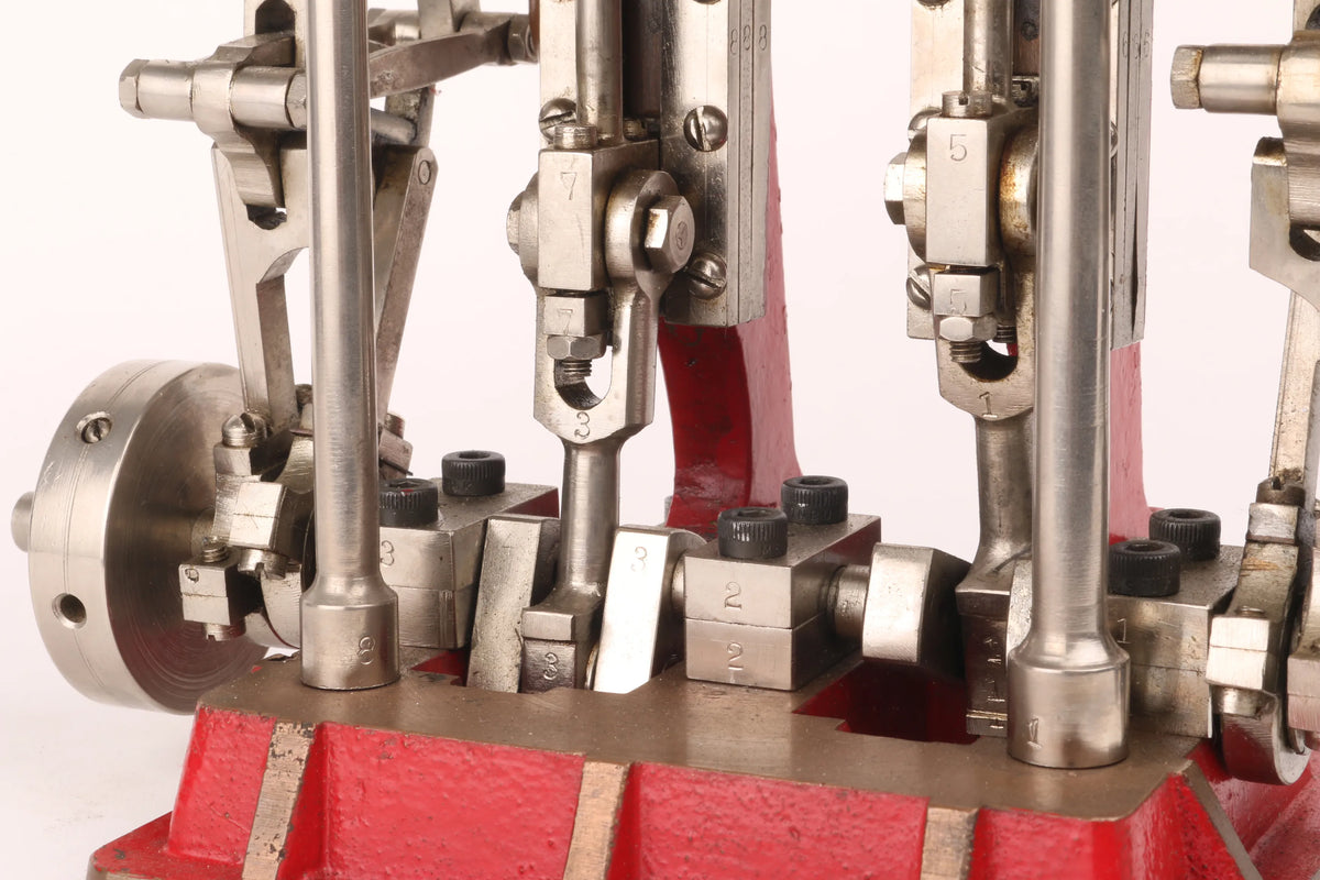 Compound twin with reversing gear