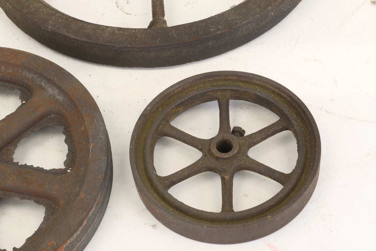 Assorted cast iron flywheels