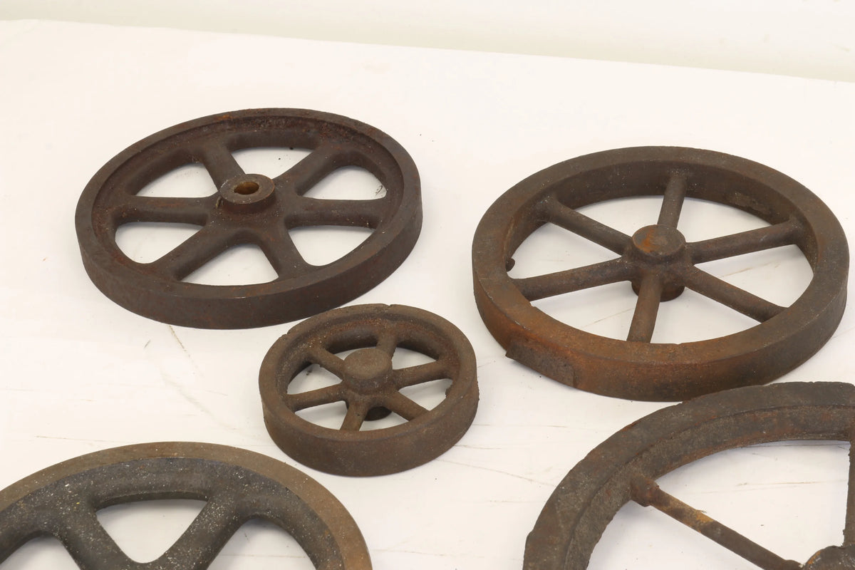 Assorted cast iron flywheels