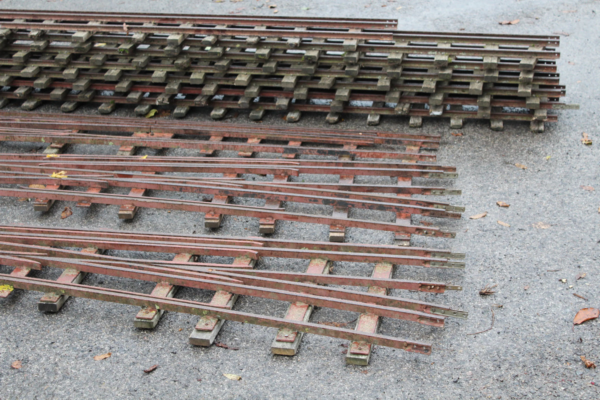 Three 5 & 7 1/4 inch multi-gauge turnouts & track panels