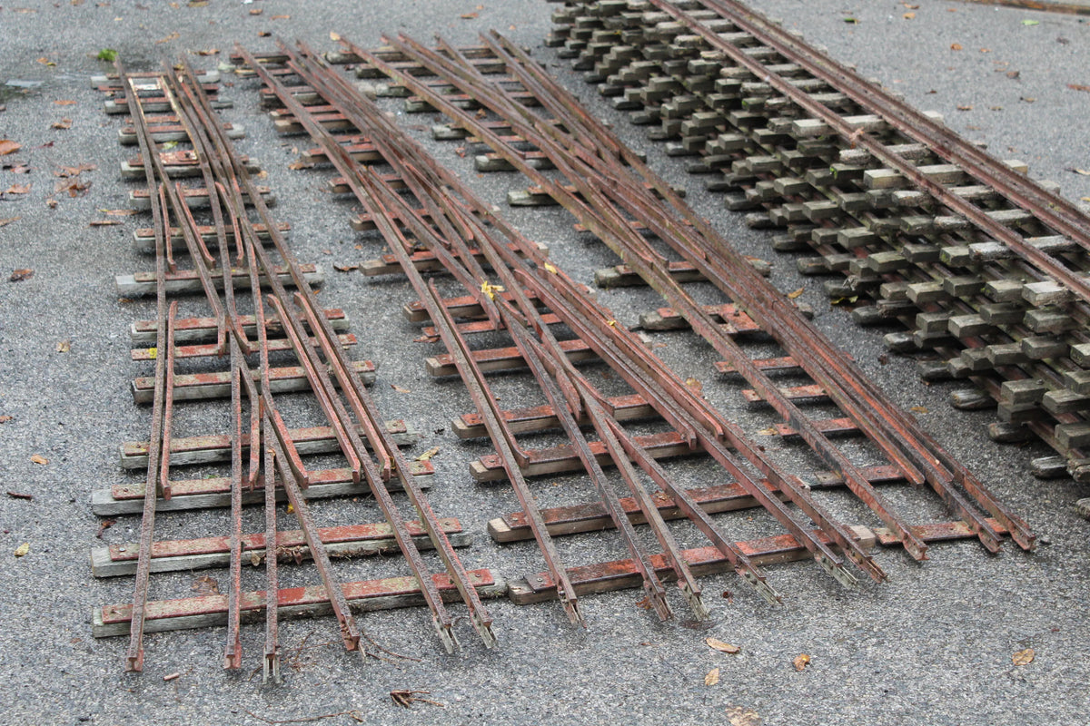 Three 5 & 7 1/4 inch multi-gauge turnouts & track panels