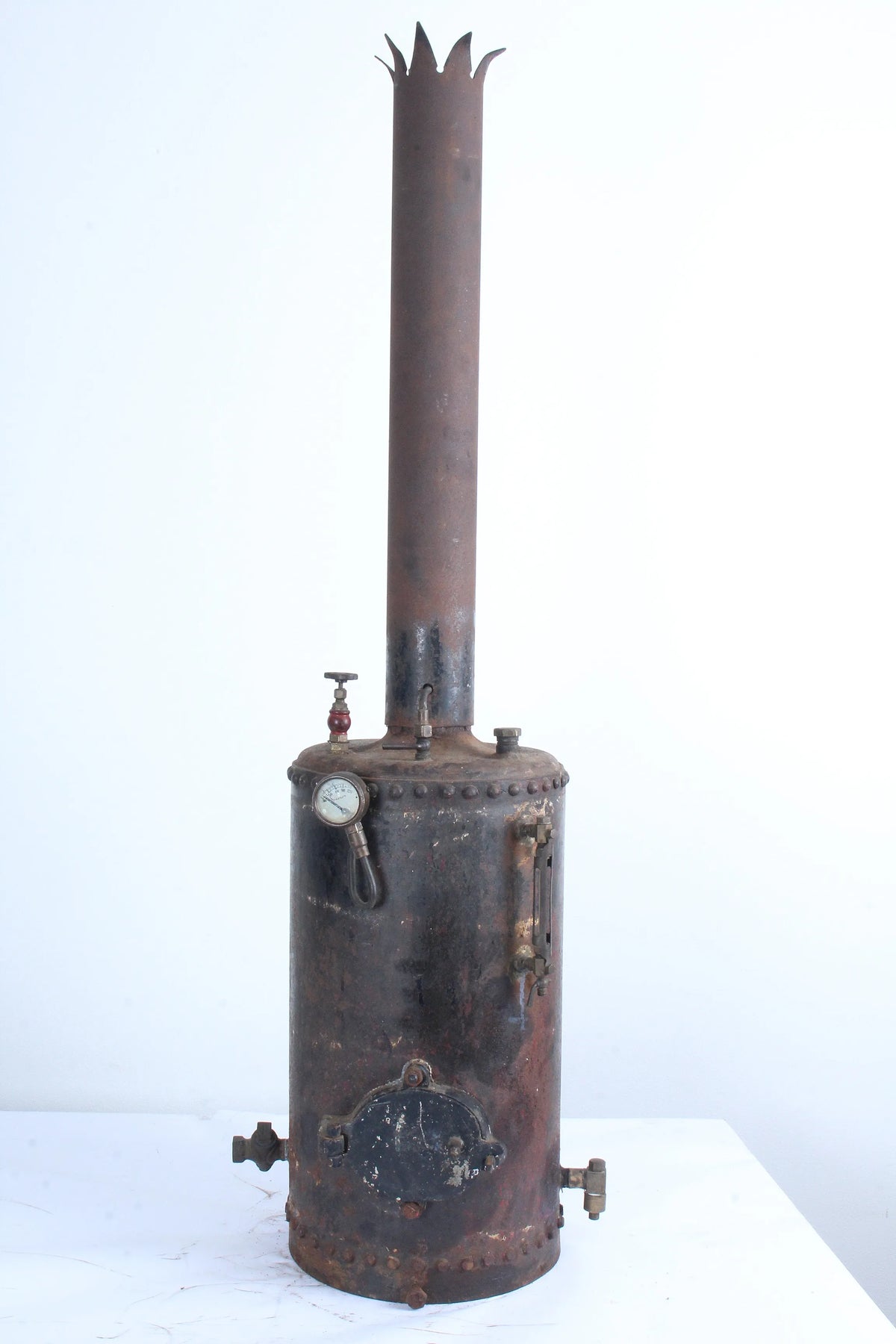 Rivetted coal-fired vertical boiler with hand pump