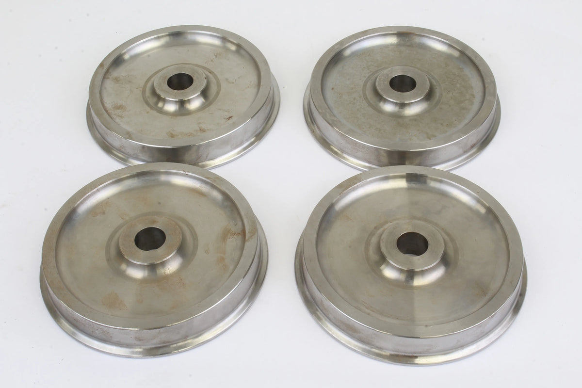 Four 7 1/4 inch gauge wheels with axles & bearings