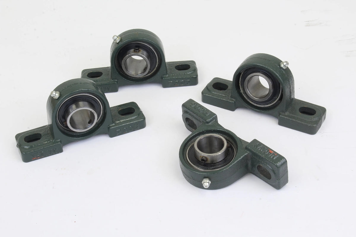 Four 7 1/4 inch gauge wheels with axles & bearings