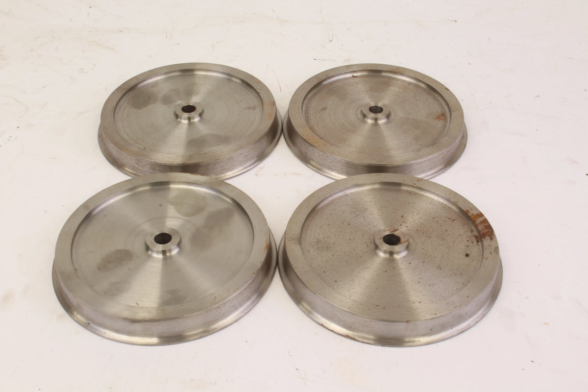 Four 7 1/4 inch gauge wheels