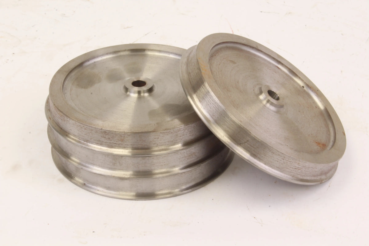 Four 7 1/4 inch gauge wheels