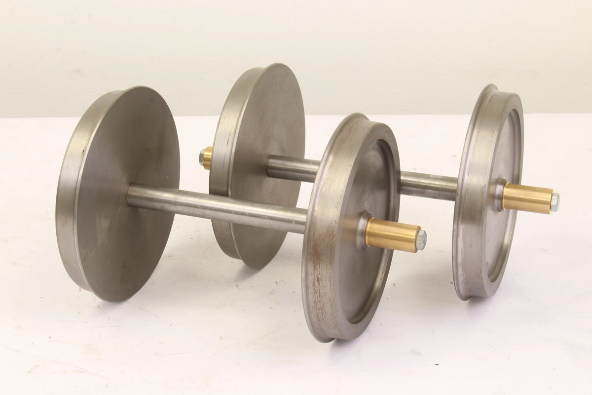 Four 7 1/4 inch narrow gauge wheelsets