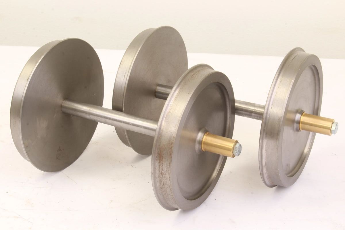 Four 7 1/4 inch narrow gauge wheelsets
