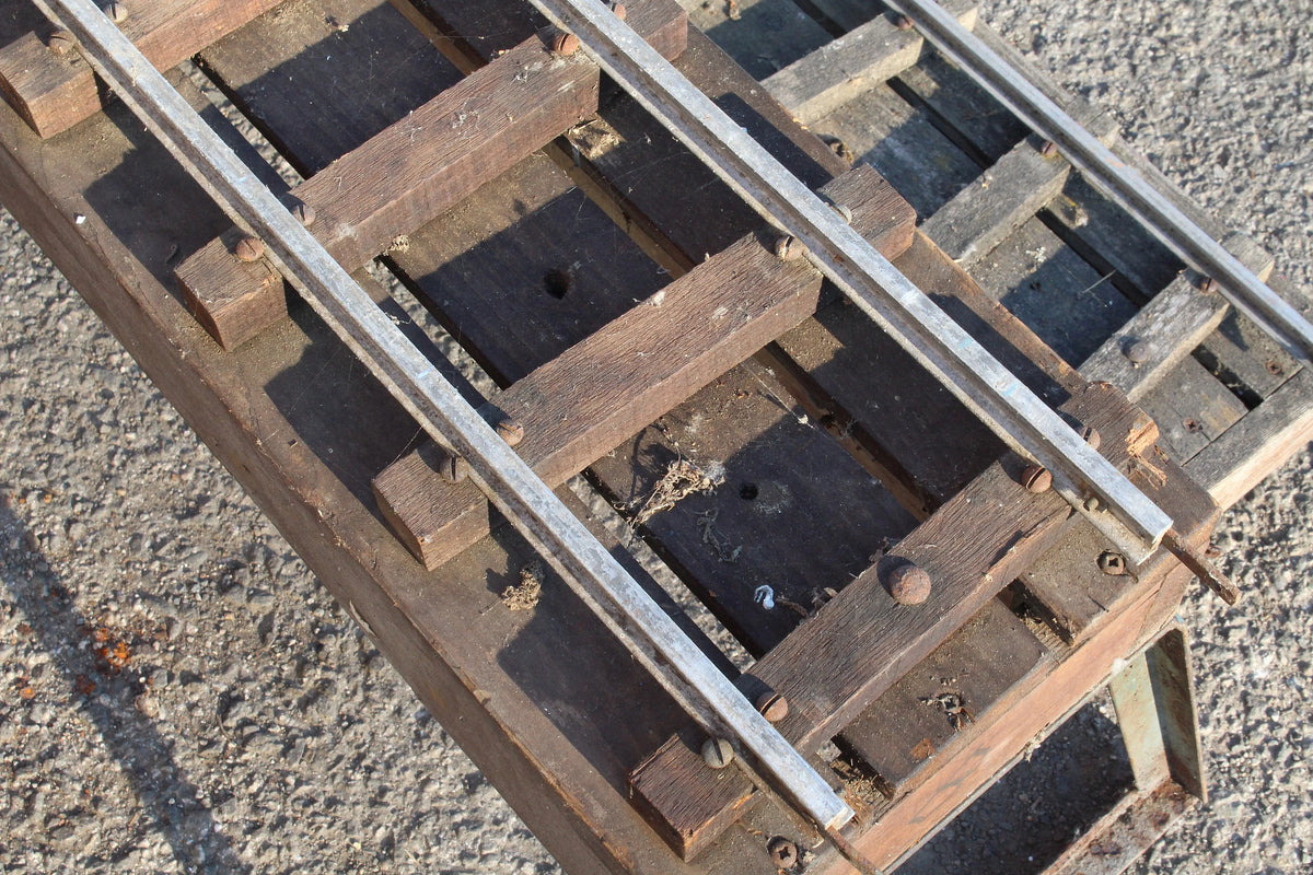 Five panels of 5 inch gauge raised level track with trestles