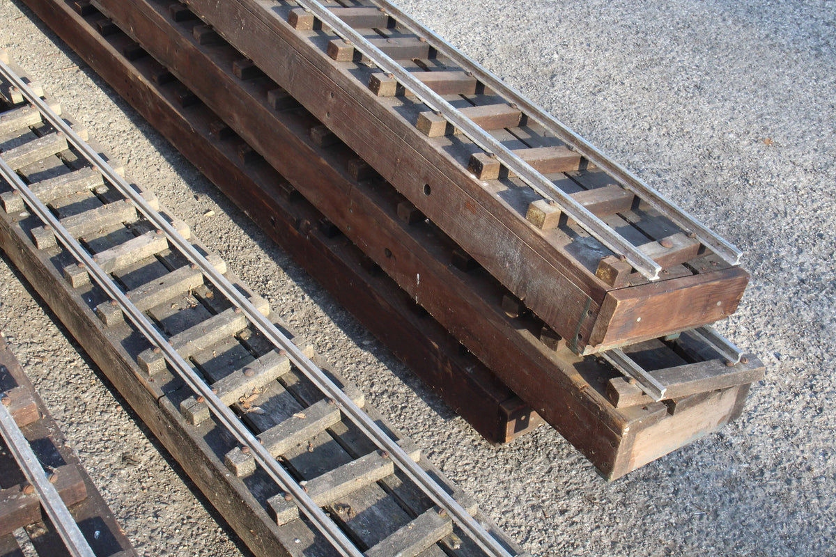 Five panels of 5 inch gauge raised level track with trestles