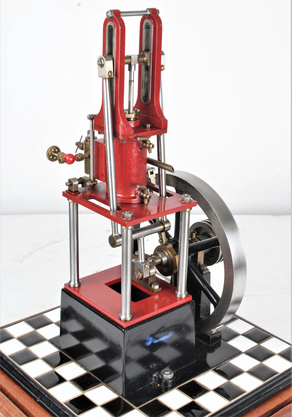 "James Coombes" table engine in glass case