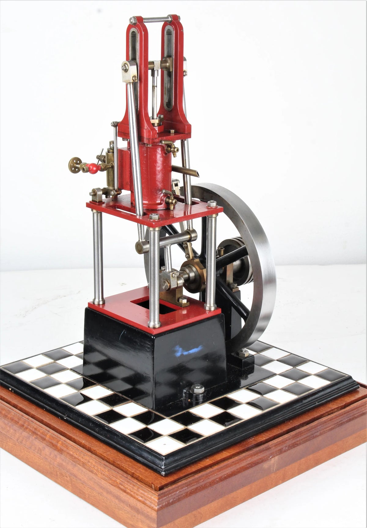 "James Coombes" table engine in glass case