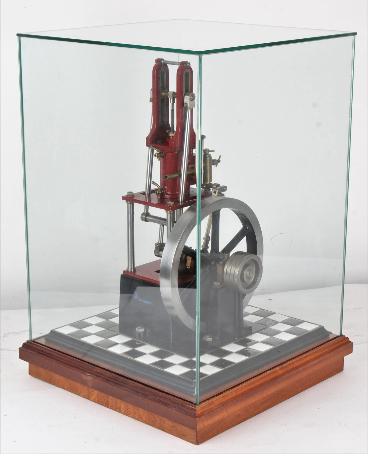 "James Coombes" table engine in glass case