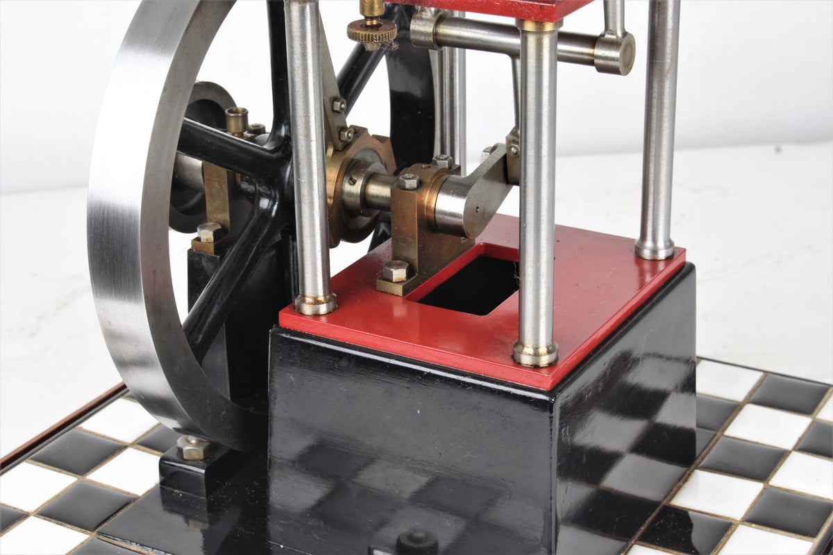 "James Coombes" table engine in glass case