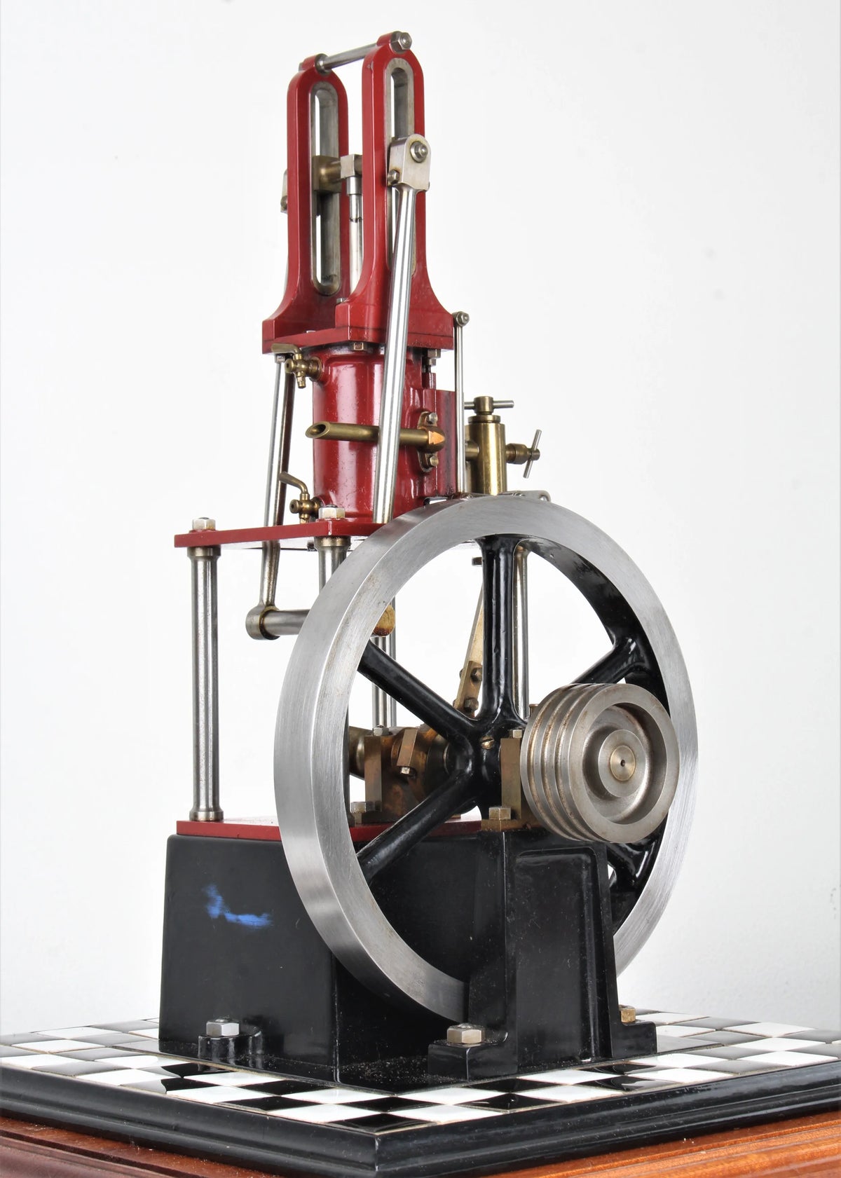 "James Coombes" table engine in glass case