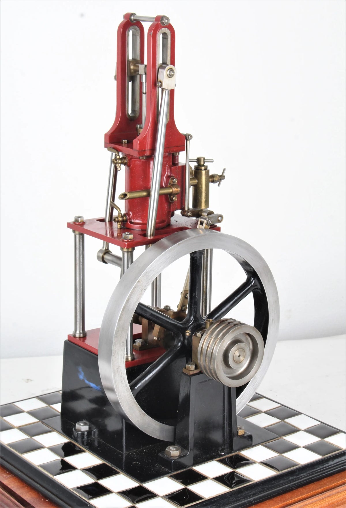 "James Coombes" table engine in glass case