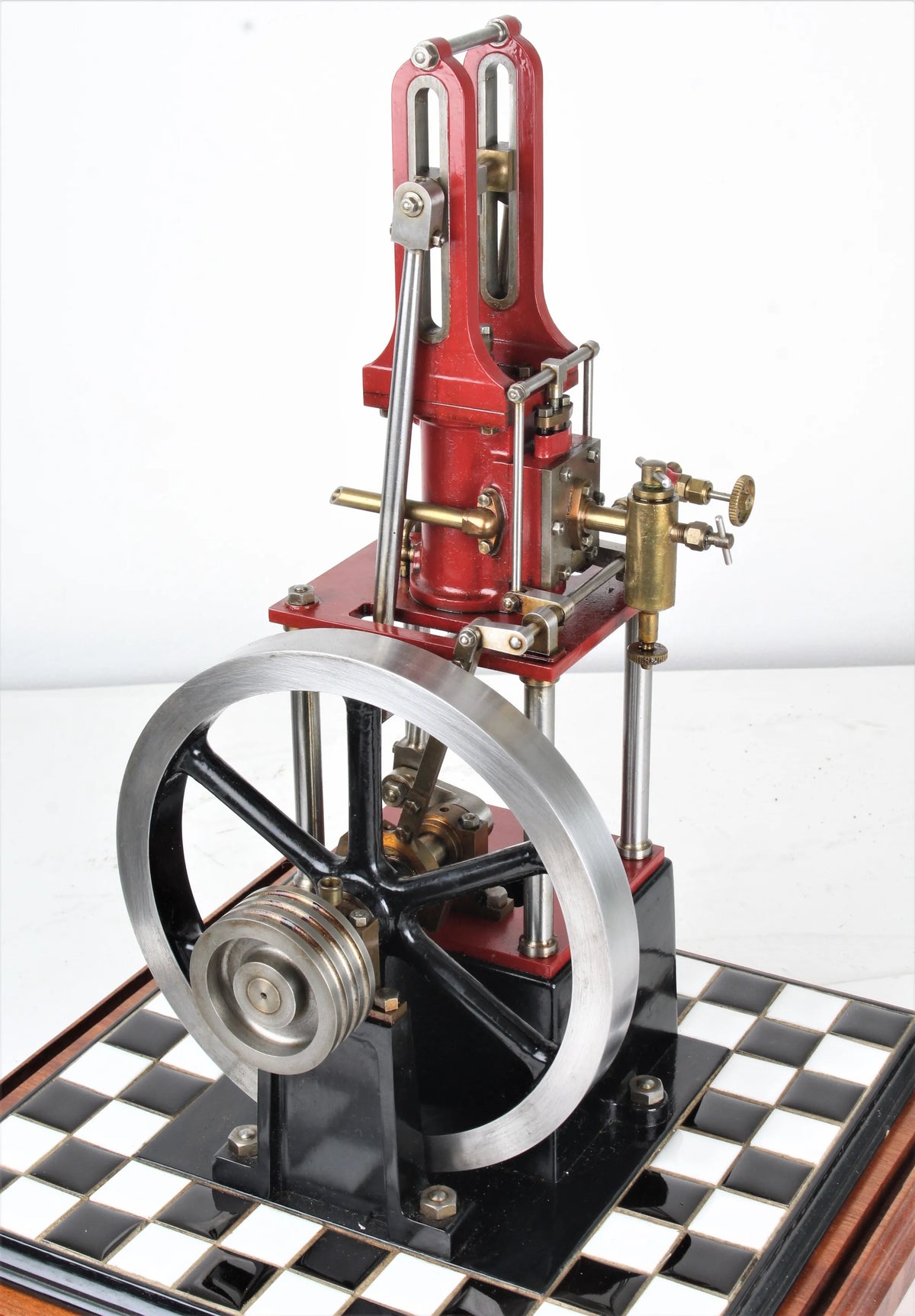 "James Coombes" table engine in glass case
