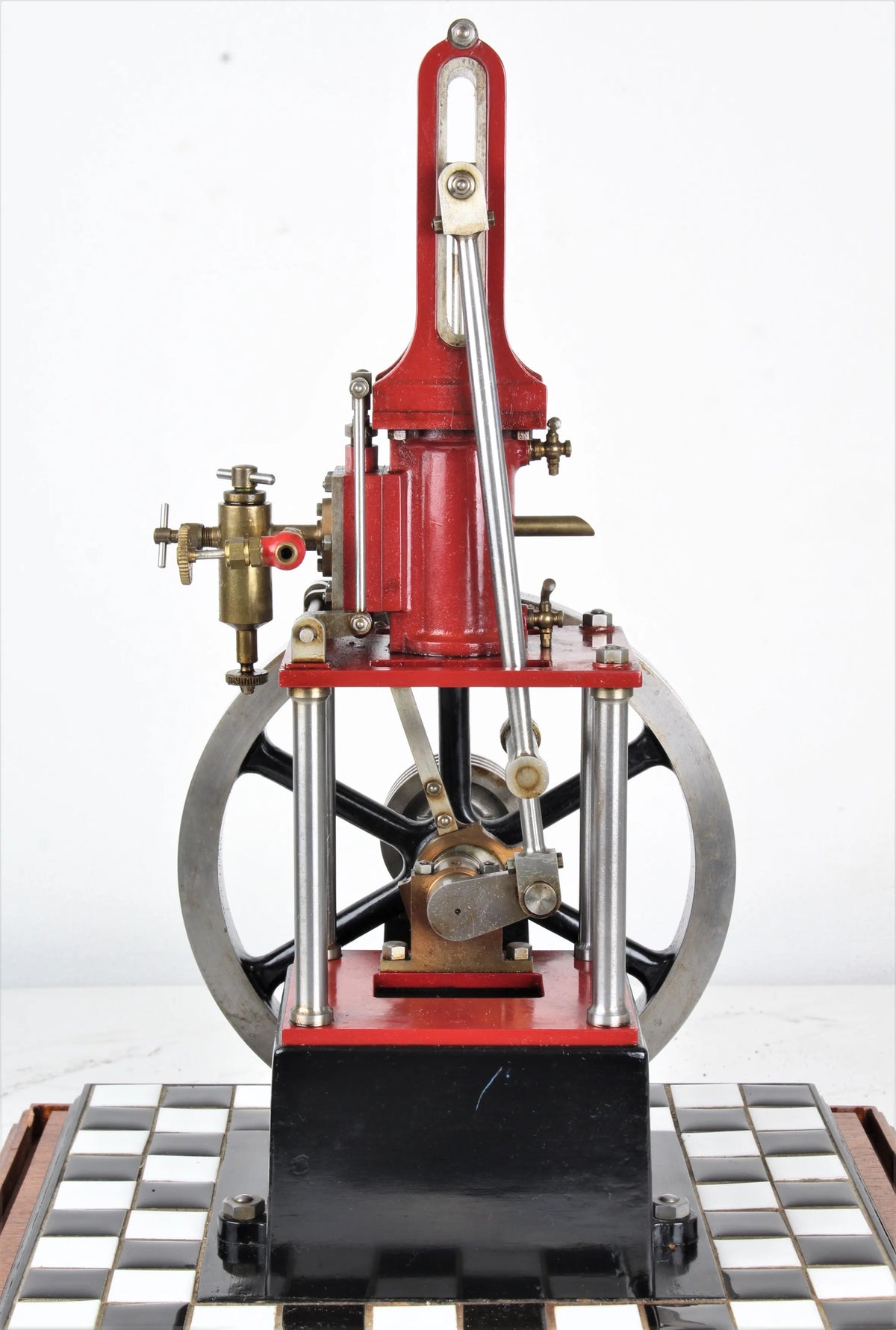 "James Coombes" table engine in glass case