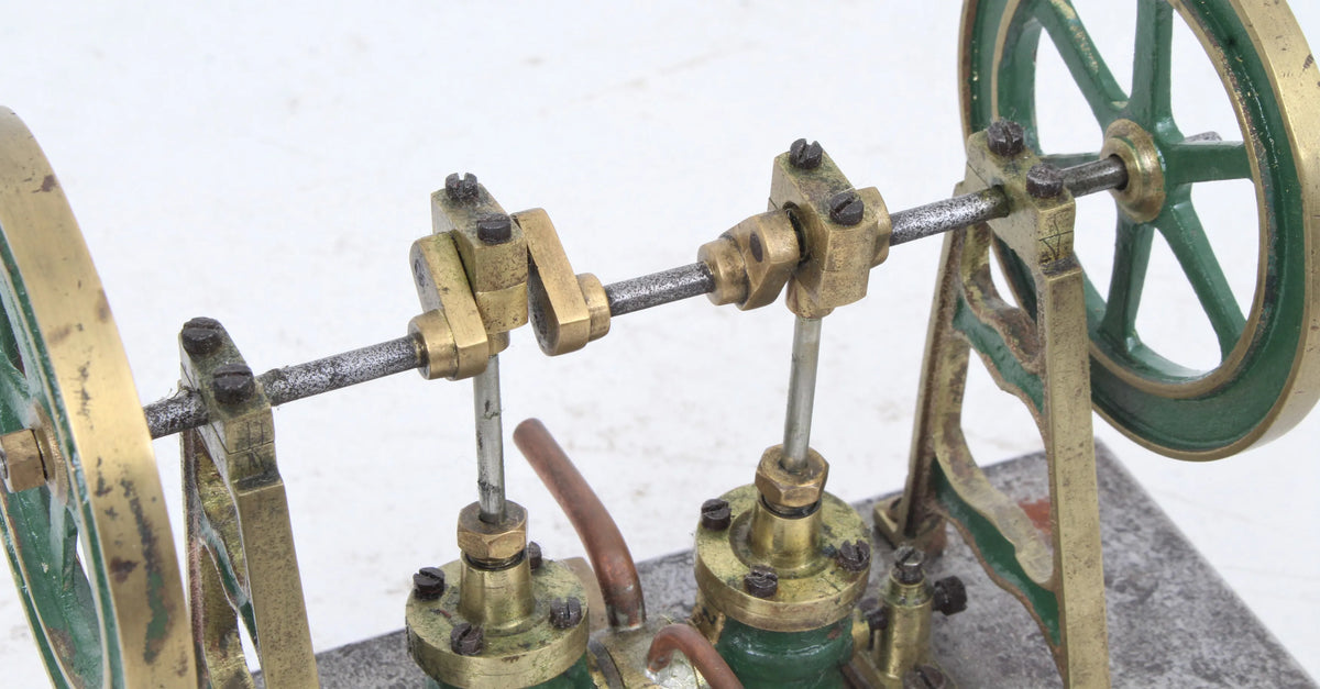 Twin cylinder vertical oscillating engine