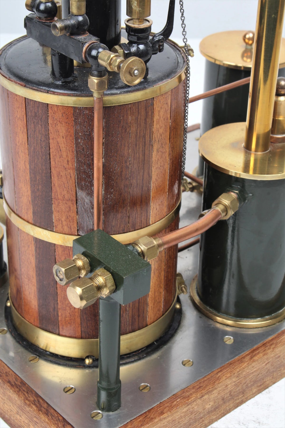 Gas-fired vertical boiler with hand pump and water tank
